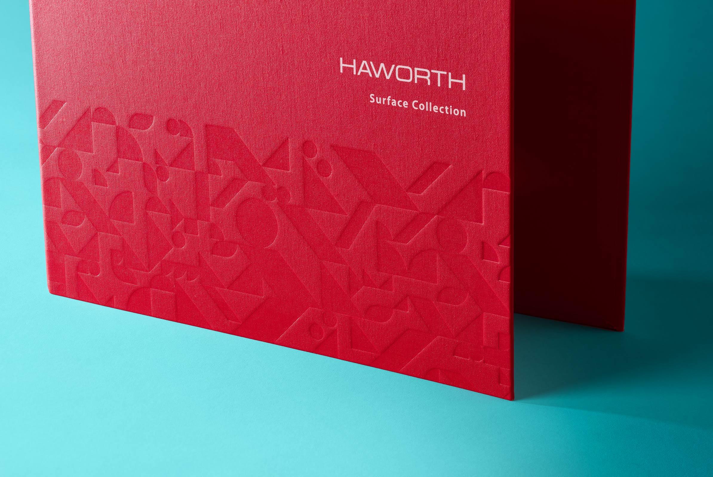 Closeup front Haworth cloth binder with debossed pattern and foil