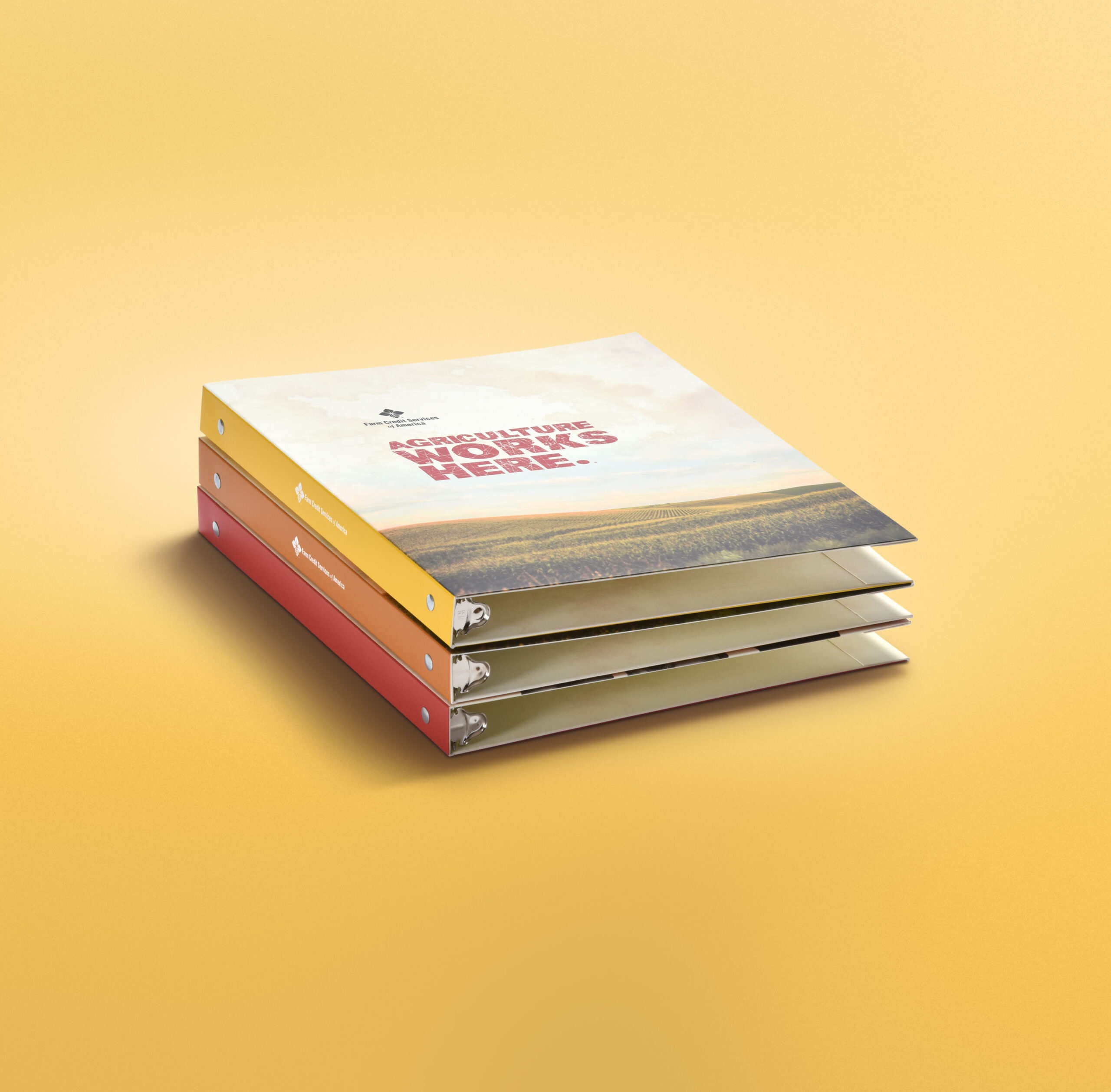 Presentation binder stack fro Farm Credit Services