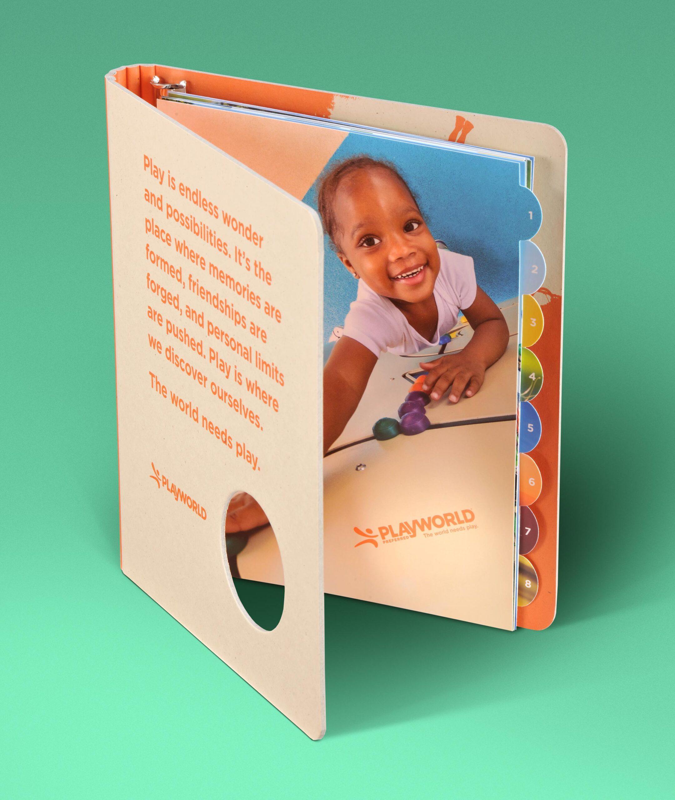 Custom binder with die-cut window for Playworld