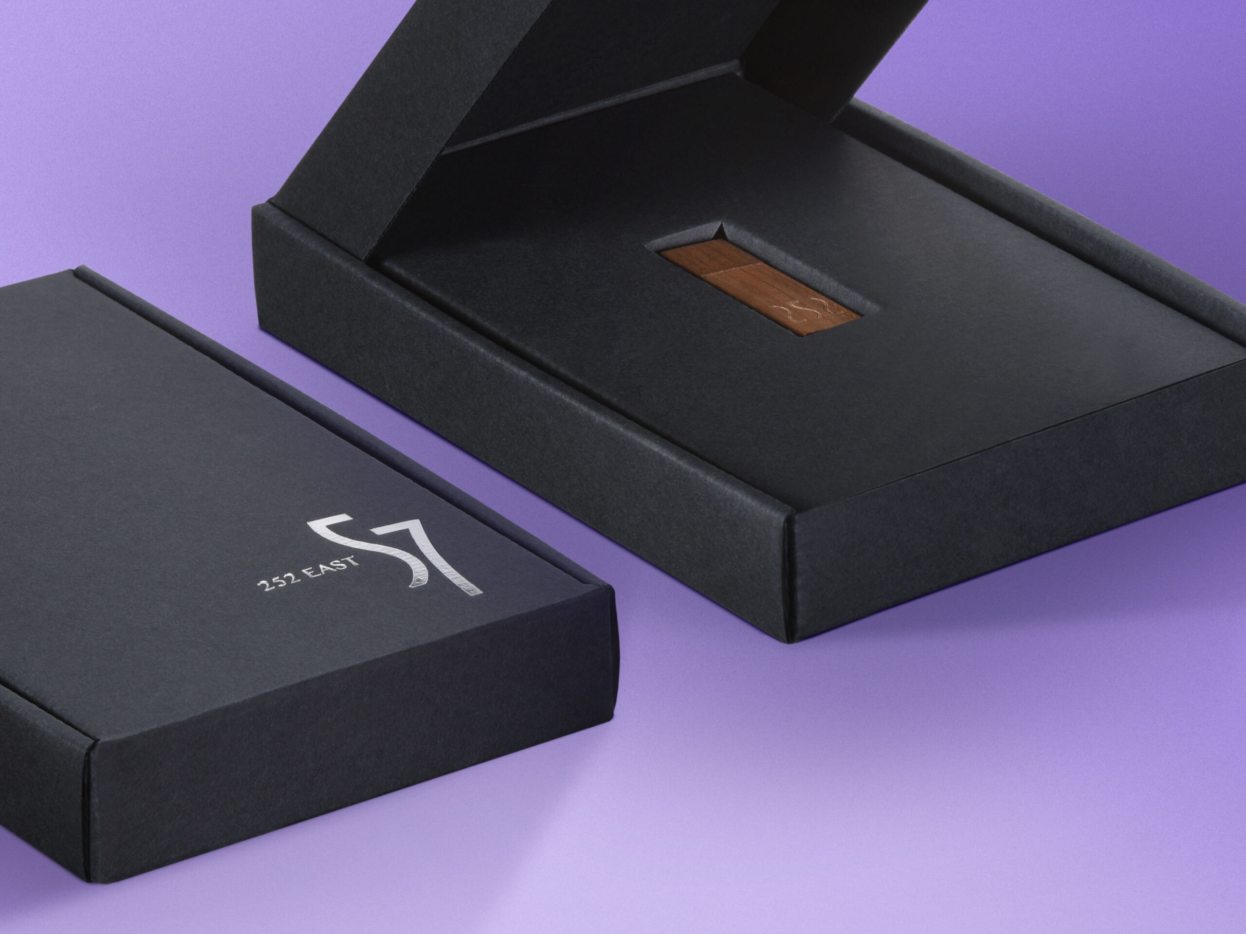 Triple black corrugated box with foil stamp and tray