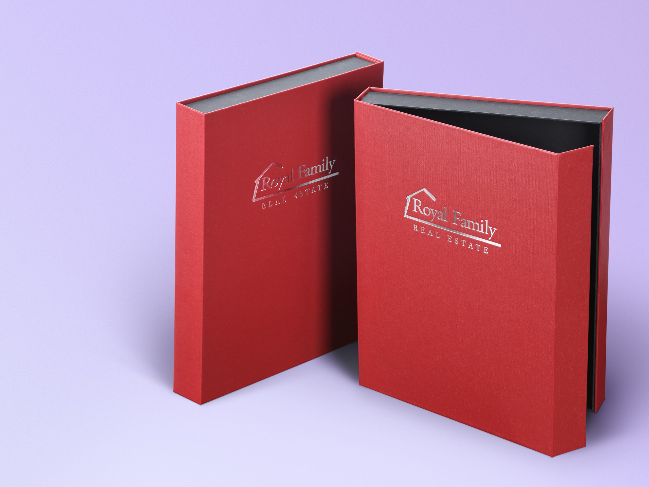 Magnetic book style CI RIGIDBOX® packaging for Royal Family Real Estate