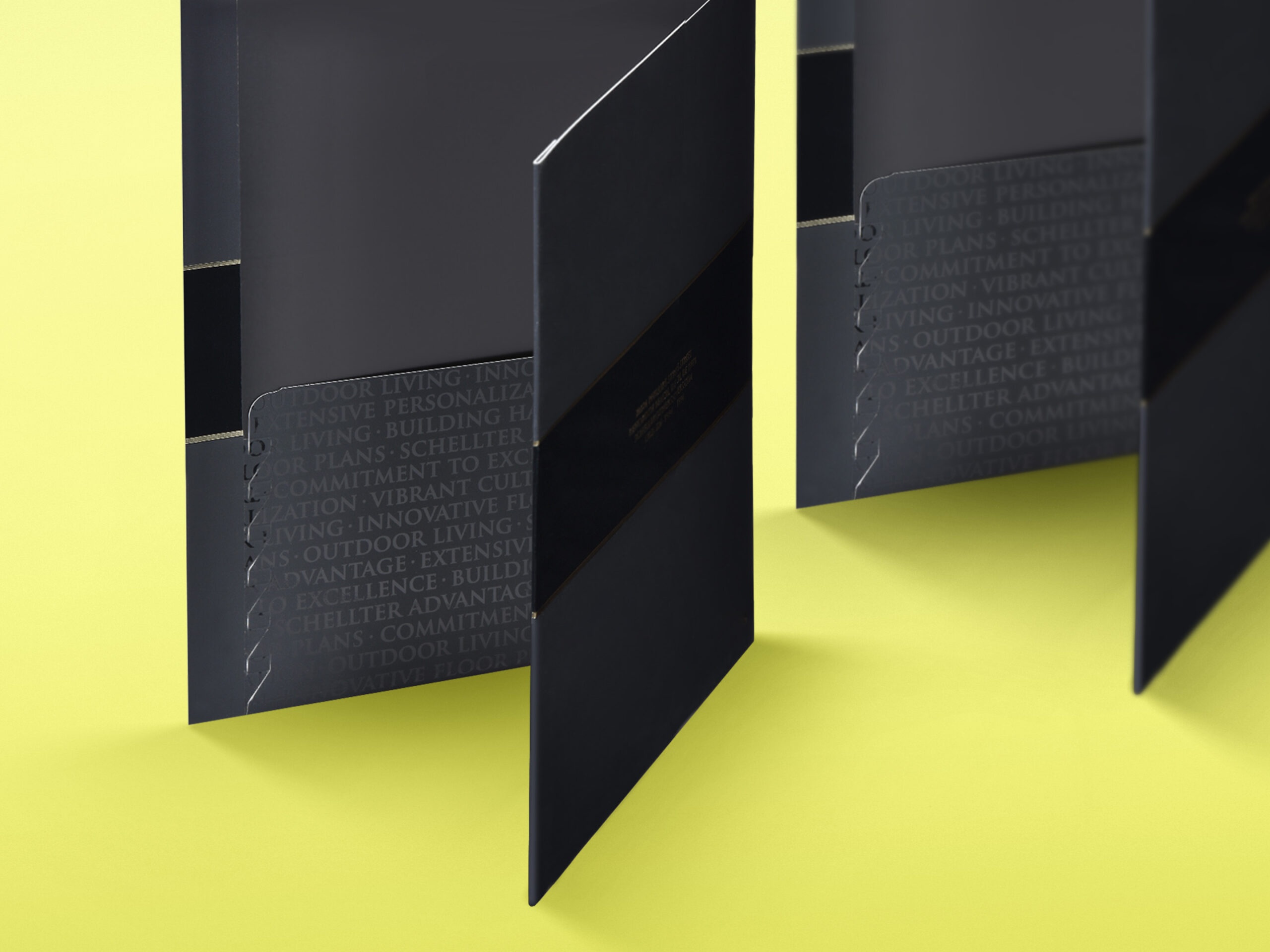 Expandable pocket construction in black folders