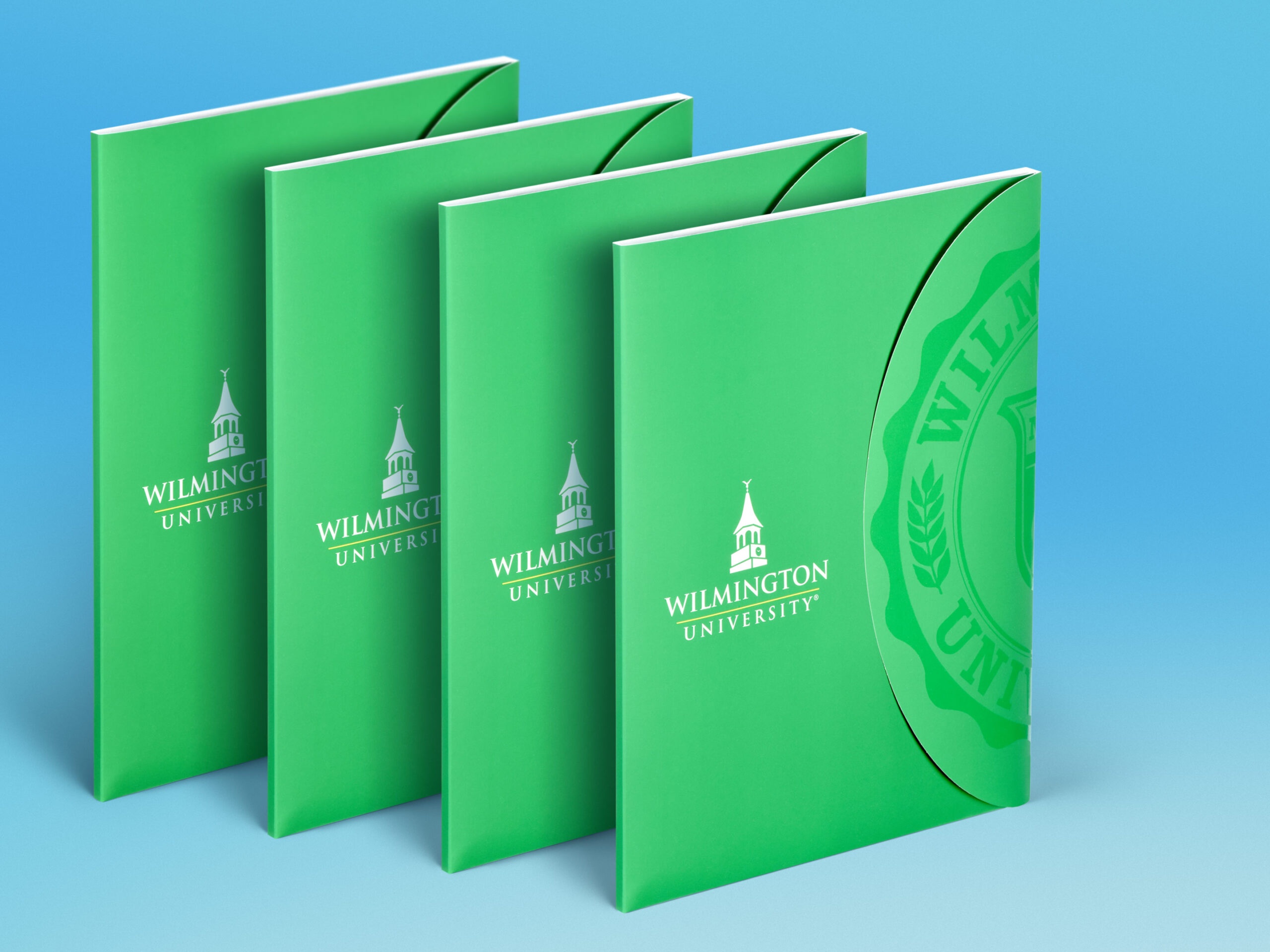 Admissions folders for Wilmington University with portfolio closure and spot gloss UV