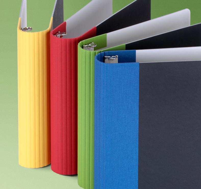 Group of round back binders with spine wrap